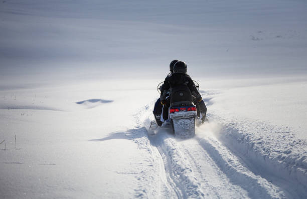 istock Driving snowmobile in Colorado, USA 1201973076