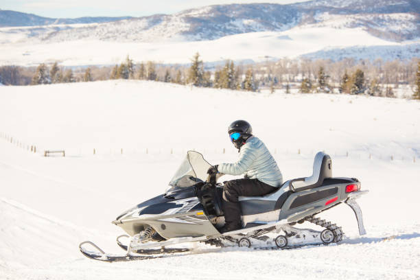 istock Driving snowmobile in Colorado, USA 1201973117