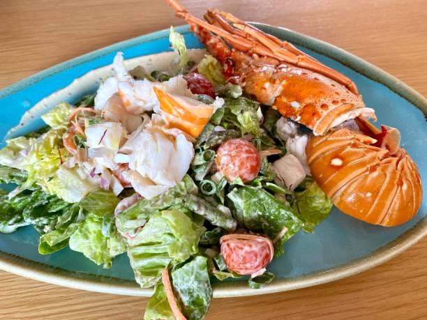 istock Australian Lobster Salad on a Blue Ceramic Plate 1201988520