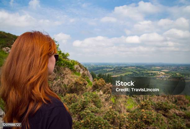 Beautiful Red Head Take In The Irish View Stock Photo - Download Image Now - Redhead, Ireland, Women