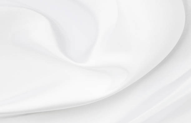 istock White gray satin texture that is white silver fabric silk background with beautiful soft blur pattern natural. 1201989906