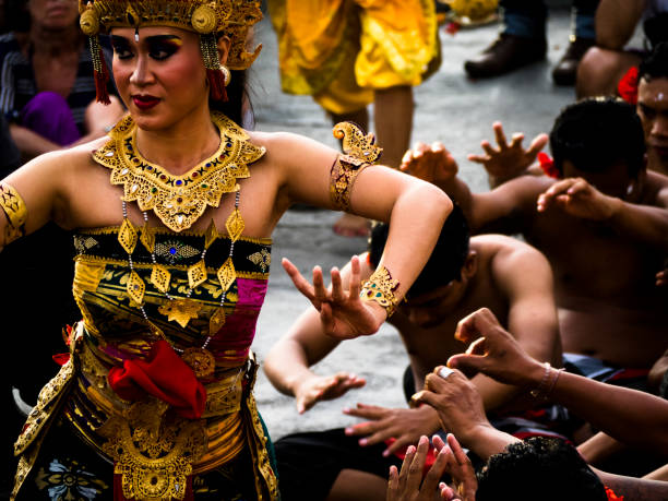 Bali, Indonesia - Januari, 2019: Bali Kecak and Fire Dance is Traditional Balinese Dance with story from fragment Ramayana and highly spiritual dance, it takes place at the tipping end of the island, at the famous temple of Uluwatu and attracts today thousands of visitors everyday.