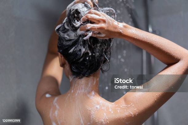 Woman Bathing And Washing Her Hair Relaxed Stock Photo - Download Image Now - Hair, Shampoo, Washing