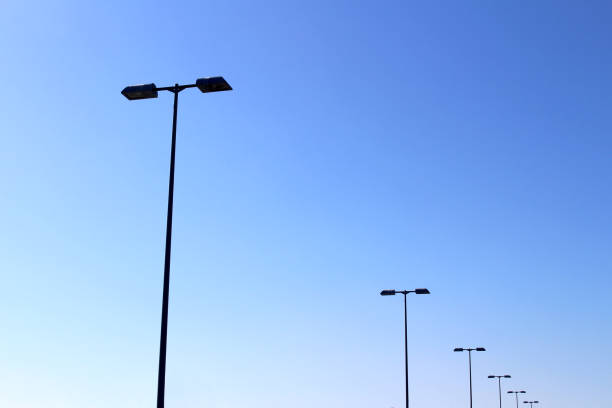 istock Highway street lights lined under the blue sky 1201996200