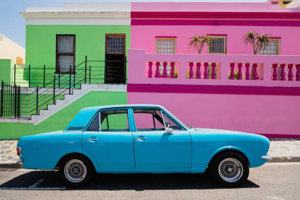 Bo-Kaap Cape Town Street Oldtimer Classic Car South Africa Old blue oldtimer - classic car in parked front of colorful house facades in the famous and vibrant Bo-Kaap district in Cape Town, South Africa, Africa

Attention Inspectors: Modified car shape, removed logos, modified background buildings, edited colors. malay quarter photos stock pictures, royalty-free photos & images