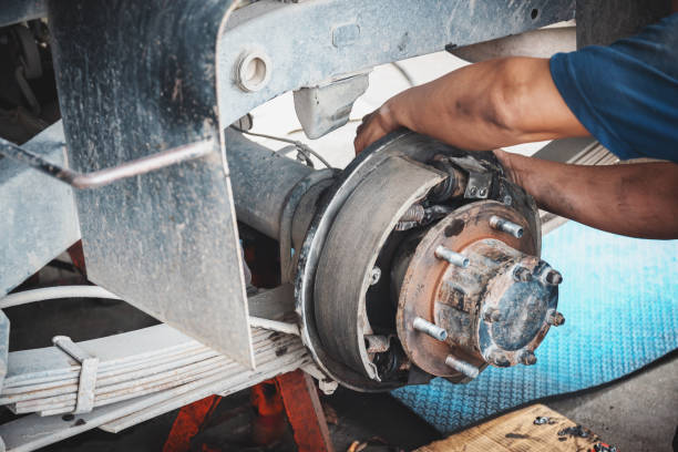 Repair the rear brake of the car Technicians remove the wheels of the car to repair the rear brakes of the car. caliper photos stock pictures, royalty-free photos & images