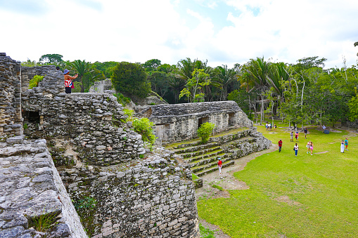 Chetumal, Mexico - January 4, 2020: Tourists at Kohunlich ruins of Mexico