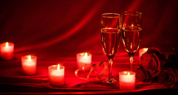 istock Champagne glasses and candles 1202013244
