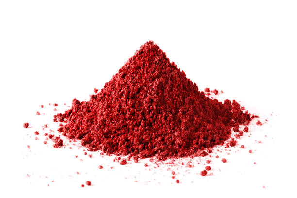 Red powder on white Pile of red powder, isolated on white background dye stock pictures, royalty-free photos & images