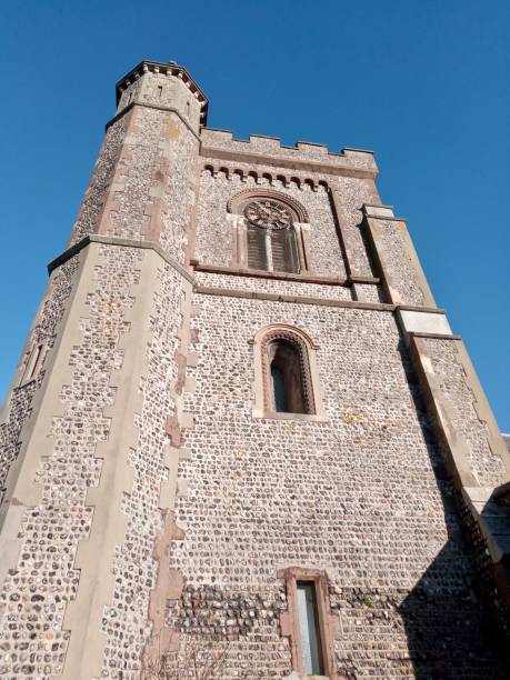 istock Church tower on a blue sky in England 1202021745