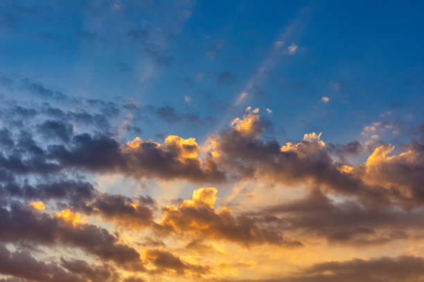 istock Sky with cloud and sun ray yellow and blue color background. With copy space for text or design. 1202024945