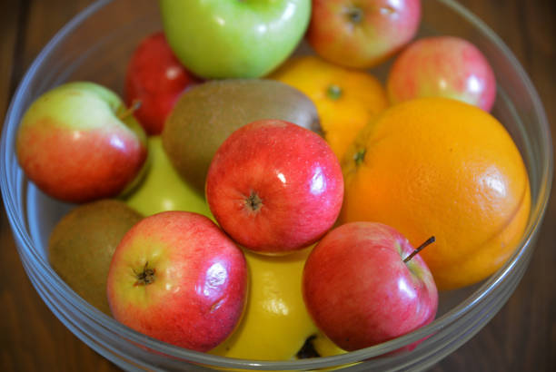 istock organic fruits in glass bowl 1202029492
