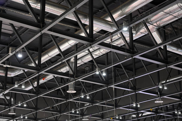 istock factory roof with lights and ventilation interior 1202029655