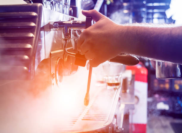 istock The bartender makes the coffee, cappuccino, cocoa, drink at the bar. 1202030530