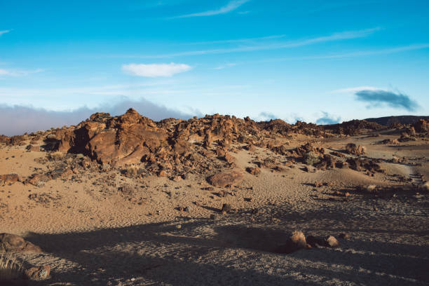 istock Rock Formations In Desert Against Sky 1202032383