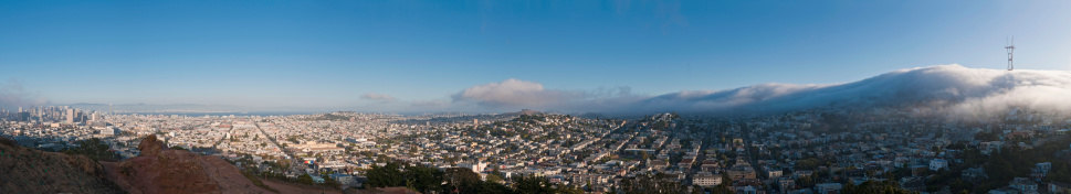 Dramatic panoramic vista across the streets and suburbs, hills and landmarks of San Francisco from the skyscrapers of downtown, past the blue waters of the Bay, the crowded blocks of the Mission District to the luxury homes and villas of Castro as the characteristic coastal fog rolls over Twin Peaks and the iconic aerials of the Sutro Tower. ProPhoto RGB profile for maximum color fidelity and gamut.\n\n[b]See more great images of San Francisco in this lightbox:[/b]\n\n[url=http://www.istockphoto.com/search/lightbox/6898088][img]http://www.fotovoyager.com/istock/lightbox_sanfrancisco.jpg[/img][/url]\n\n[b]See many more great images of California in this lightbox:[/b]\n\n[url=http://www.istockphoto.com/search/lightbox/2837117][img]http://www.fotovoyager.com/istock/lightbox_california.jpg[/img][/url]\n\n[b]See many more great panoramic images here:[/b]\n\n[url=http://www.istockphoto.com/search/lightbox/384048][img]http://www.fotovoyager.com/istock/lightbox_panoramas.jpg[/img][/url]