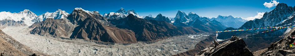 Dramatic panoramic view over the Ngozumba Glacier in the Solo Khumbu region of Nepal to the iconic rocky pyramid of Mt. Everest, from the snow capped summits of Cho Oyu, Gyachung Kang and Pumo Ri, the Everest massif, Nuptse and Lhotse and the magnificent peaks of Ama Dablam, Kang Tega and Thamserku in this sweeping Himalayan vista. ProPhoto RGB profile for maximum color fidelity and gamut.

[b]See more great Himalayan images in this lightbox:[/b]

[url=http://www.istockphoto.com/search/lightbox/7298188][img]http://www.fotovoyager.com/istock/lightbox_nepal.jpg[/img][/url]

[b]See many more great landscape images in this lightbox:[/b]

[url=http://www.istockphoto.com/search/lightbox/300969][img]http://www.fotovoyager.com/istock/lightbox_horizons.jpg[/img][/url]

[b]See many more great panoramic images here:[/b]

[url=http://www.istockphoto.com/search/lightbox/384048][img]http://www.fotovoyager.com/istock/lightbox_panoramas.jpg[/img][/url]