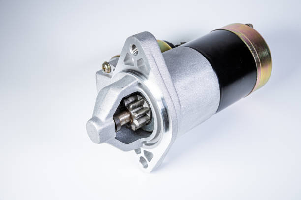 istock Starter of an internal combustion engine New Spare part for car on a gray background 1202041004