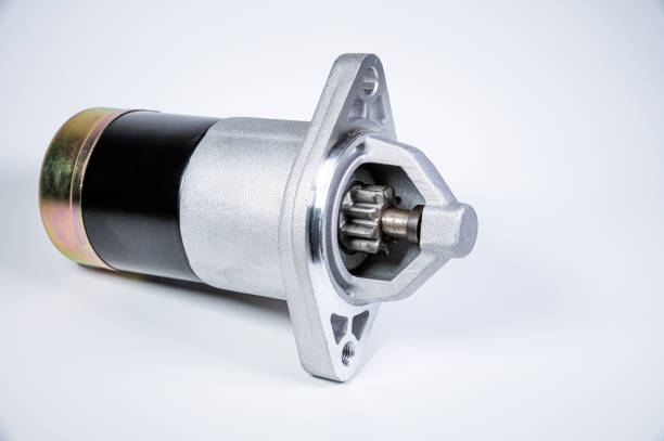 istock Starter of an internal combustion engine New Spare part for car on a gray background 1202041098