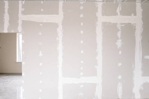 istock Drywall wall home interior decoration at construction site with copy space 1202042372