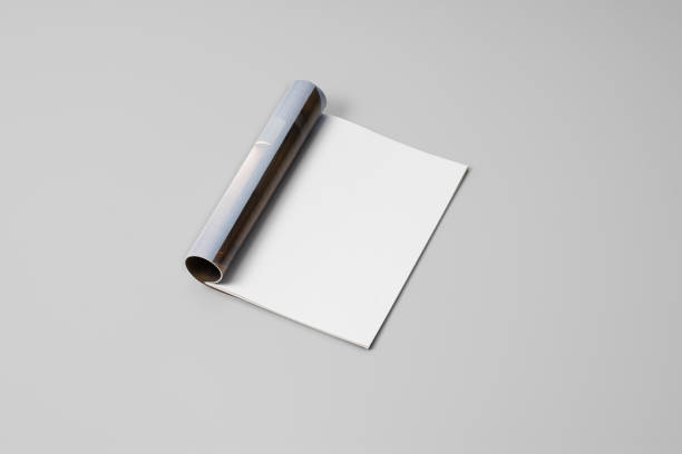 istock Mock-up magazine, newspaper or catalog on gray background. Blank page 1202042460