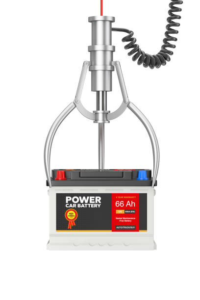 istock Winner Concept. Rechargeable Car Battery 12V Accumulator with Abstract Label in Chrome Robotic Claw. 3d Rendering 1202042482