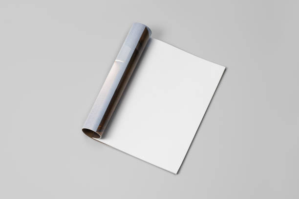 istock Mock-up magazine, newspaper or catalog on gray background. Blank page 1202042517
