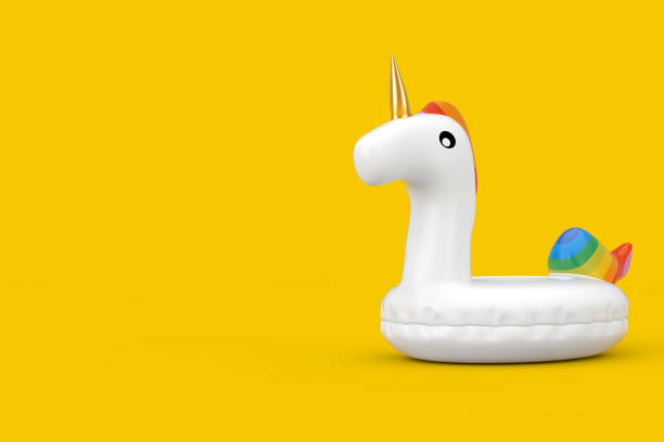istock Funny Inflatable Unicorn Ring for Summer Pool. 3d Rendering 1202043245