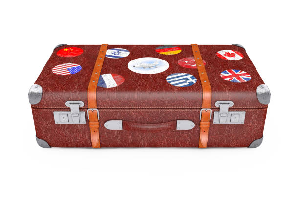 istock Retro Leather Brown Threadbare Suitcase With Travel Stickers, Metal Corners and Belts. 3d Rendering 1202043439