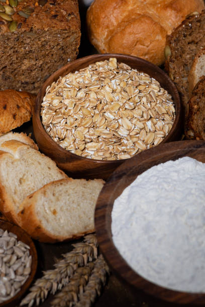 istock fresh bread and assortment of baked goods, vertical 1202045102