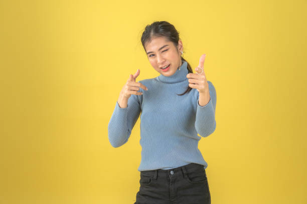 istock Cheerful woman pretending 1202048739