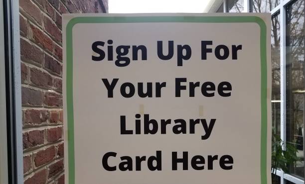 istock sign up for free library card here sign on window 1202050229