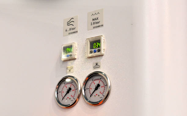 istock Round mechanical manometers, abstract industrial background 1202050379