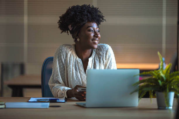 istock Businesswoman using laptop in office. 1202051116