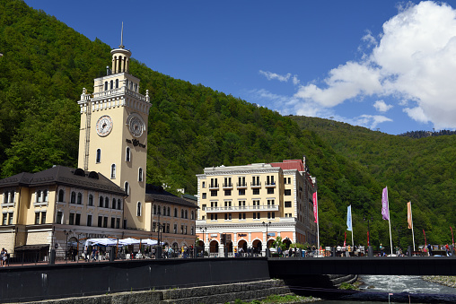 Sochi, Russia, may 09, 2016. View of the main square and the town hall of the Rosa Khutor ski resort on a Sunny may day.