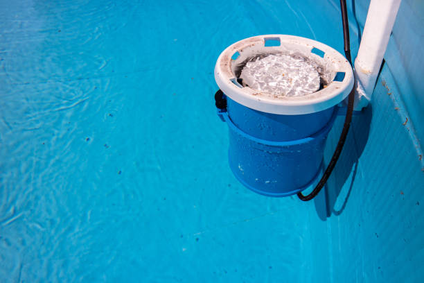 Pool filter in the garden pool Pool filter in the garden pool bullet cartridge photos stock pictures, royalty-free photos & images