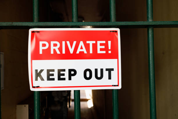 istock Private sign on a green metal gate 1202052663
