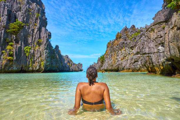 istock One single woman in bikini posing at 