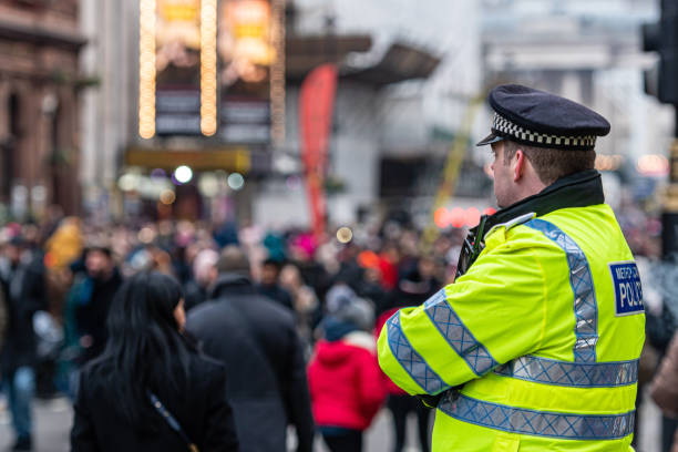 Police patrols the streets  at the London New Years Day Parade 2020, London, UK London, UK - January 1, 2020: Police patrols the streets  at the London New Years Day Parade 2020 metropolitan police stock pictures, royalty-free photos & images