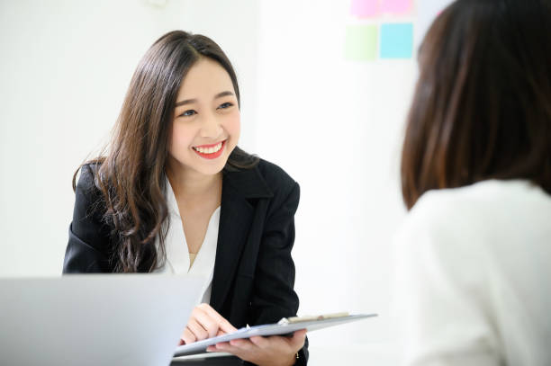 job interview, we are hiring, human resource and recruitment concept. beautiful young asian businesswoman talking applicant people - human resources job search skill teaching imagens e fotografias de stock