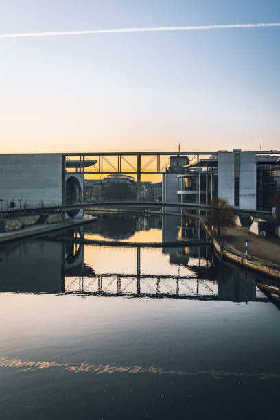 istock bridge in government district in Berlin at sunrise 1202057567