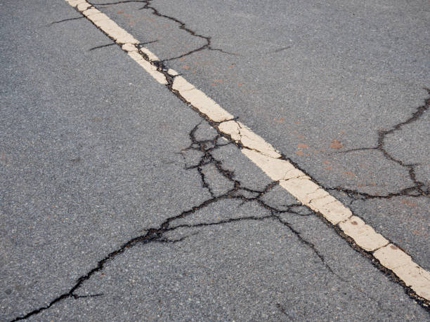 istock Attention cracks in the road 1202059662