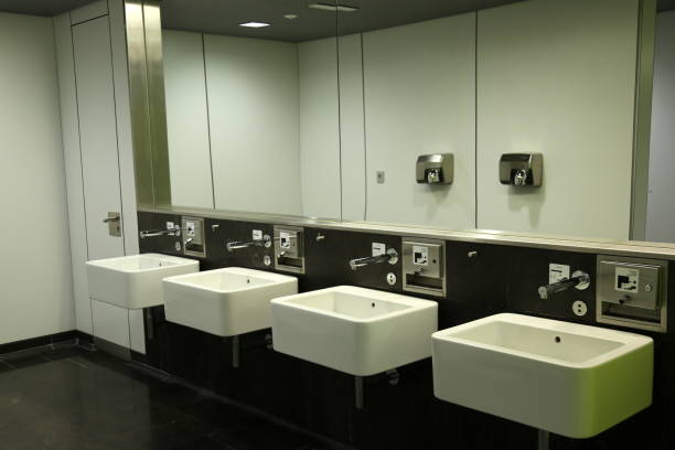 istock Washbasins and mirror in a public bathroom 1202060101