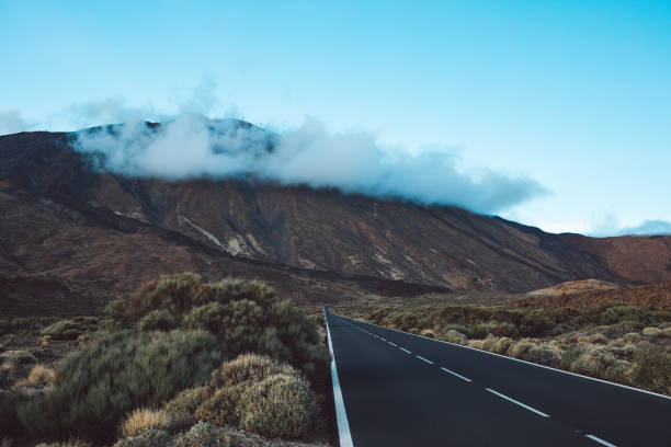 istock Scenic View Of Road By Mountains Against Sky 1202061686