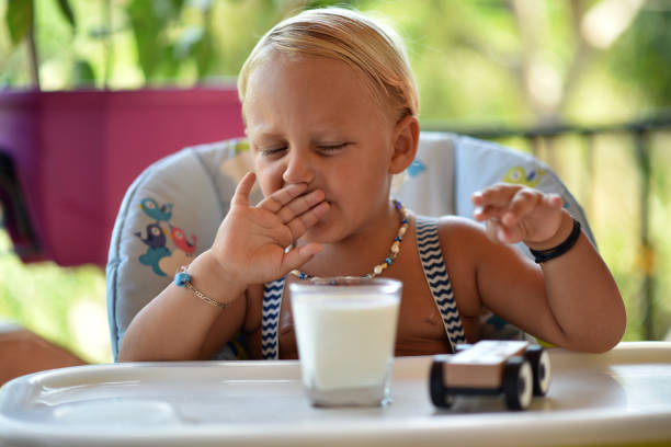 little child does not want to drink milk
