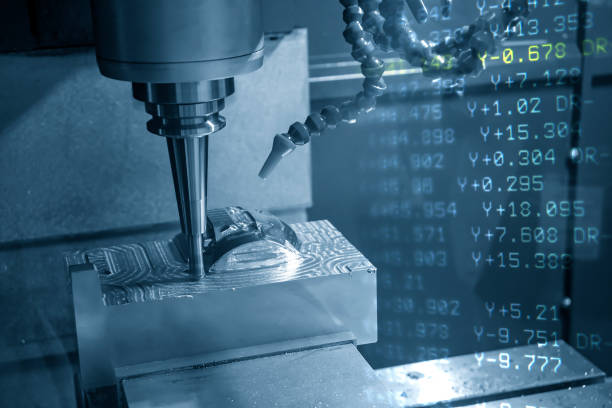 istock The abstract scene of the G-code data  and the CNC milling machine cutting the injection mold parts with solid ball endmill tools. 1202065993