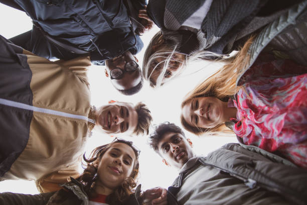 istock Cooperation concepts - Group of teenager working together 1202072064
