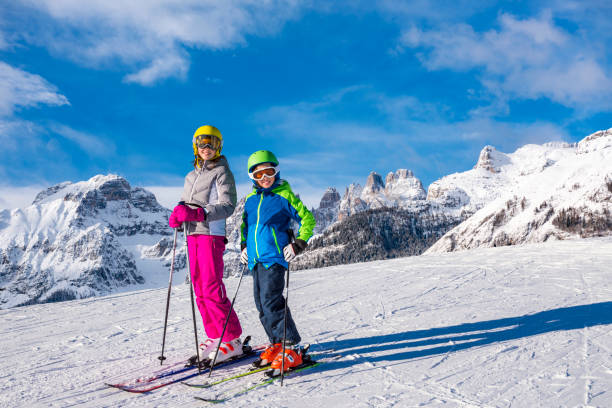 istock Children have fun on the high altitude ski slope - Alps 1202073957