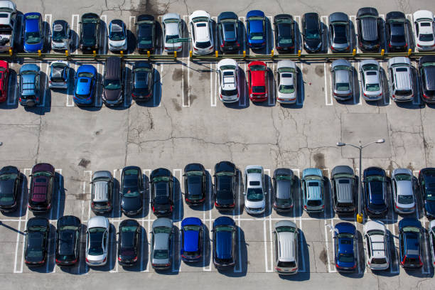 istock Parking lot with parked cars 1202075600