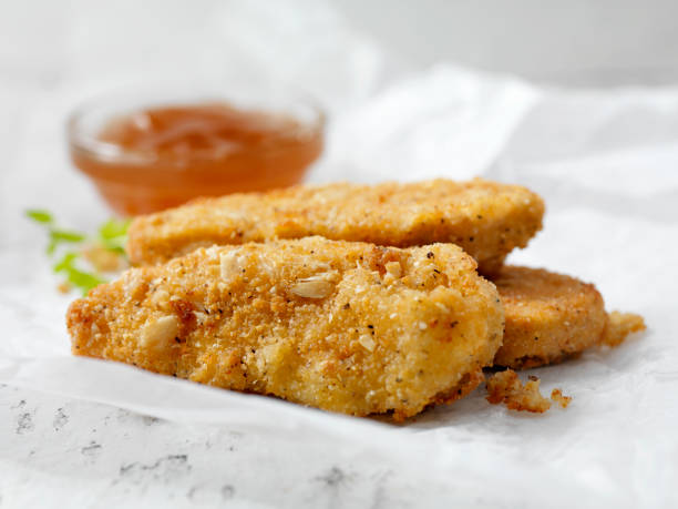 istock Vegan, Meatless-Plant Based Protein Chicken Strips with a Seven Grain Coating 1202078336